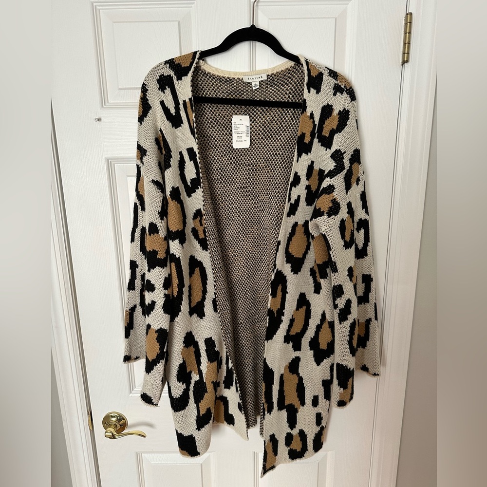Woman’s leopard sweater/cardigan size L brand new